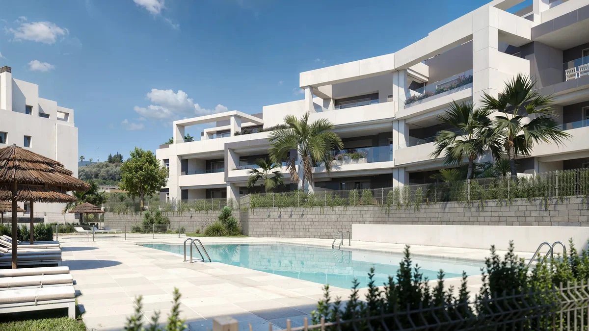 Vanian Gardens IV in Estepona: low-rise blocks, palms and pool